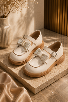 Chaussures Mary Jane beige avec nœud pailleté doré et bride boucle pour fille